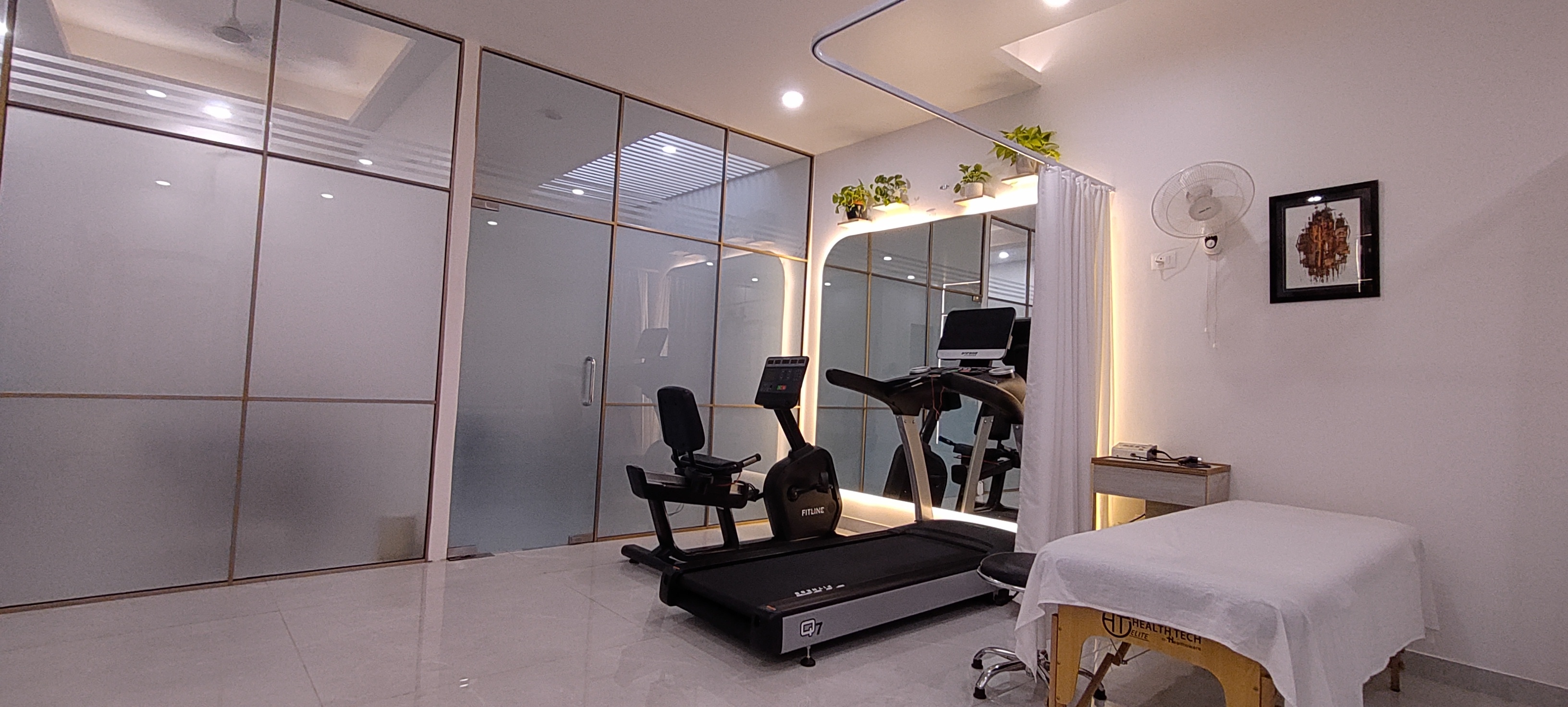 Rehab gym with treadmill and exercise equipment
