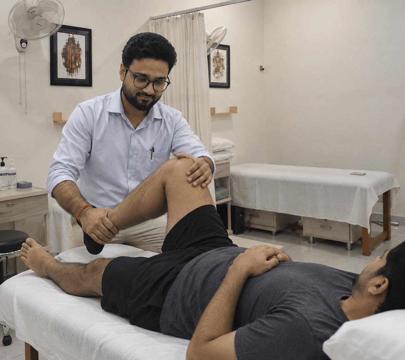 Dr. Pravesh Kumar, Founder of Kynexa Physiotherapy, providing hands-on manual therapy