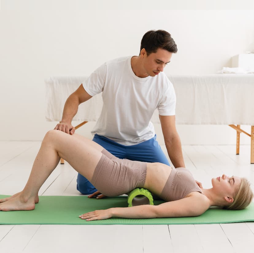 Physiotherapist explaining treatment plan at home